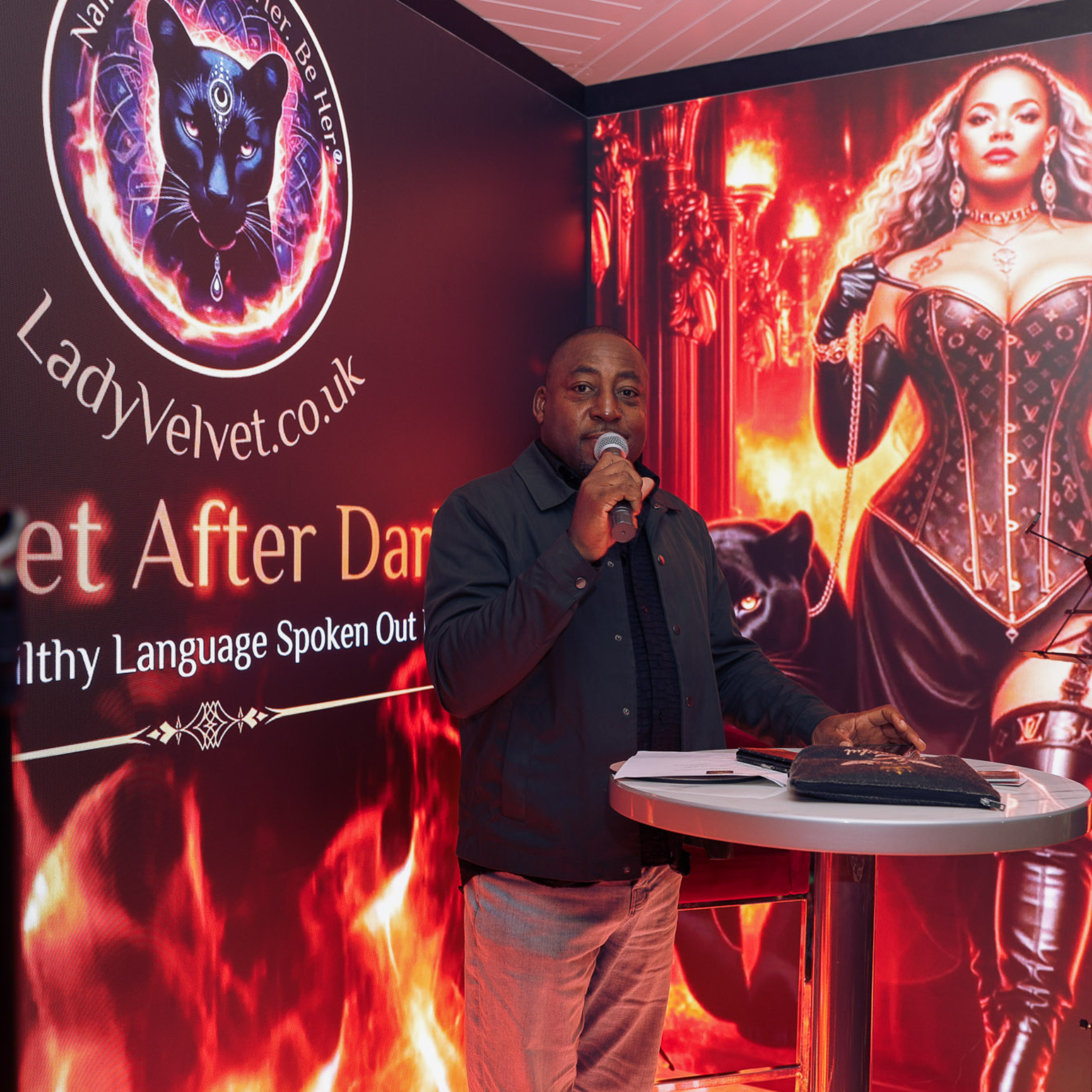Lady Velvet speaking on stage at Velvet After Dark London erotic spoken word event