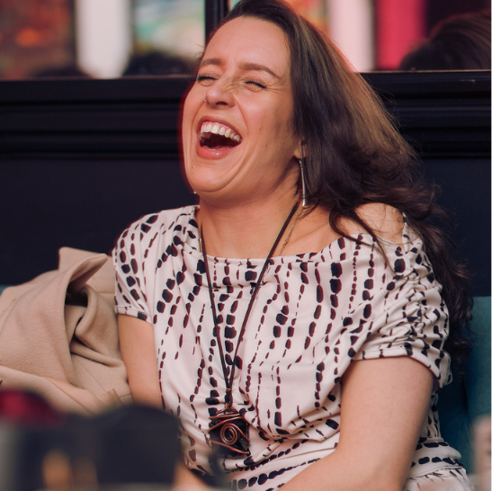 Lady Velvet speaking on stage at Velvet After Dark London erotic spoken word event